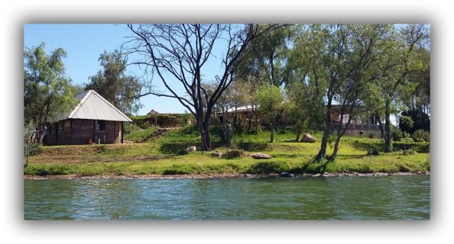 Bottle House from the water
