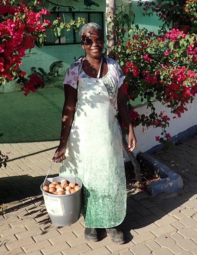 Liina with a bucket of eggs